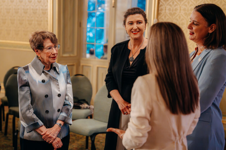 Guests networking and having conversations during an official event at Government House Sydney